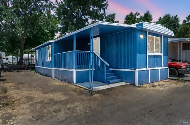 a view of backyard of house