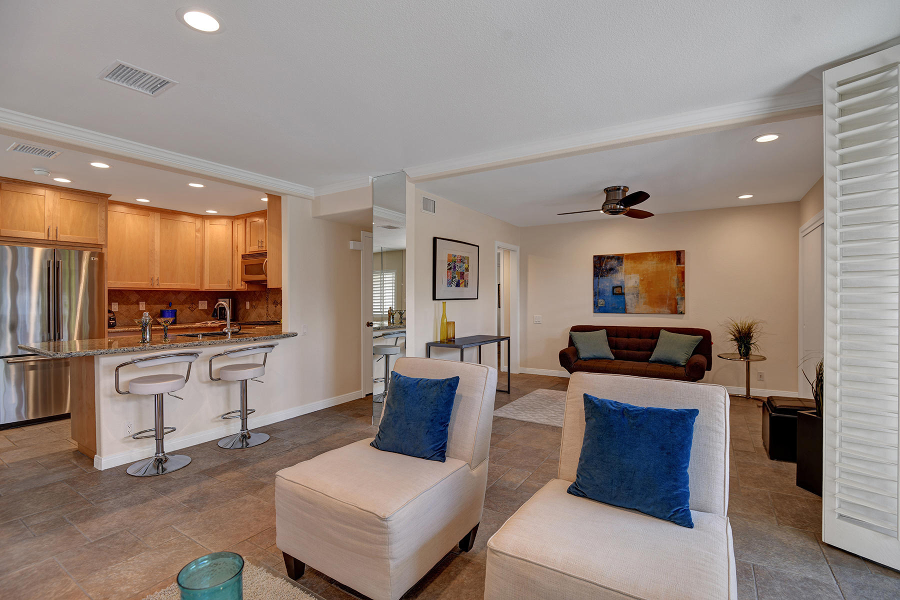 1111 East Ramon Road, Unit 58 Palm Springs, CA 92264 - Photo 8 of 33 n-LIVING ROOM TO DEN AND KITCHEN NO SCRE