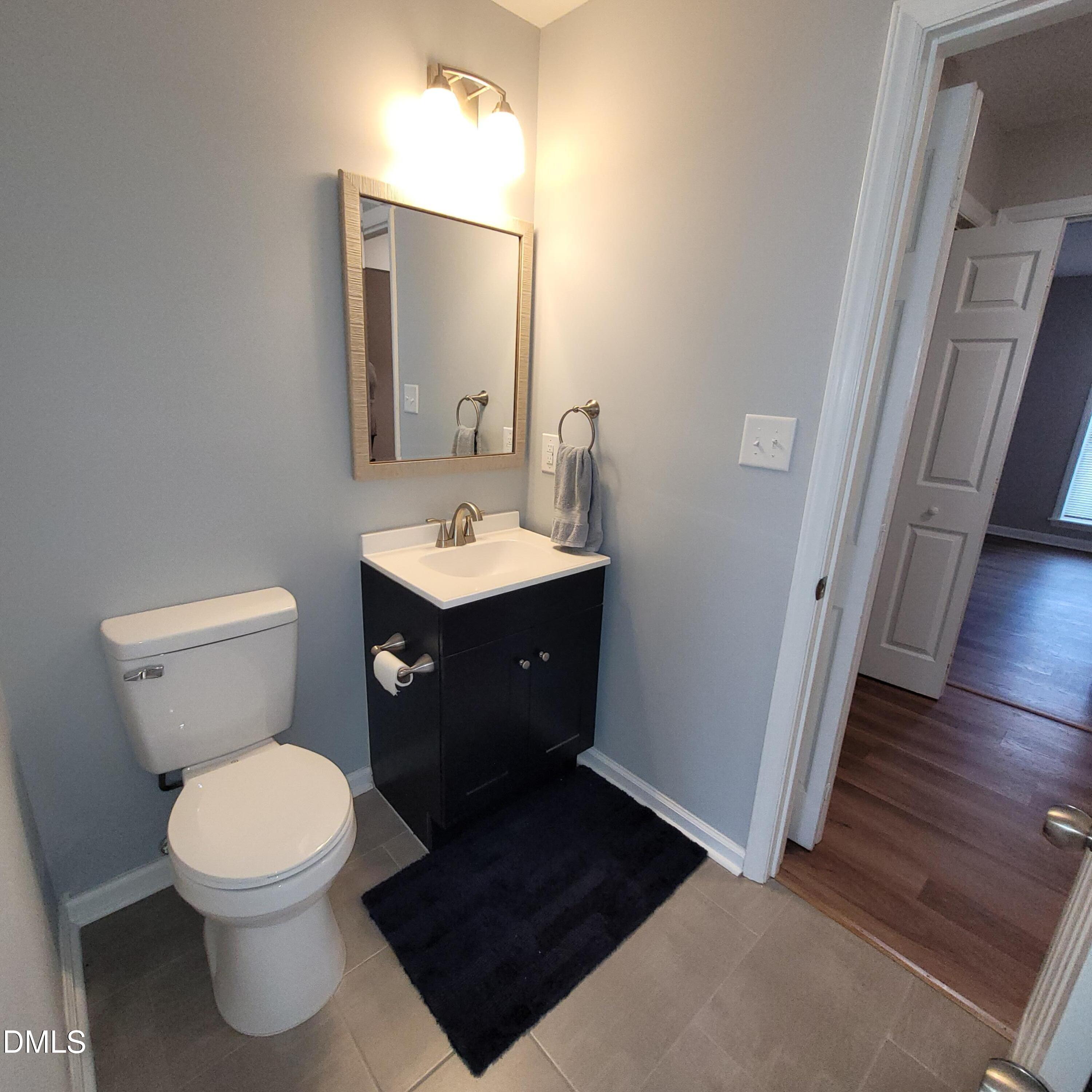 4651 Timbermill Court, Unit 103 Raleigh, NC 27612 - Photo 21 of 24 half bath
