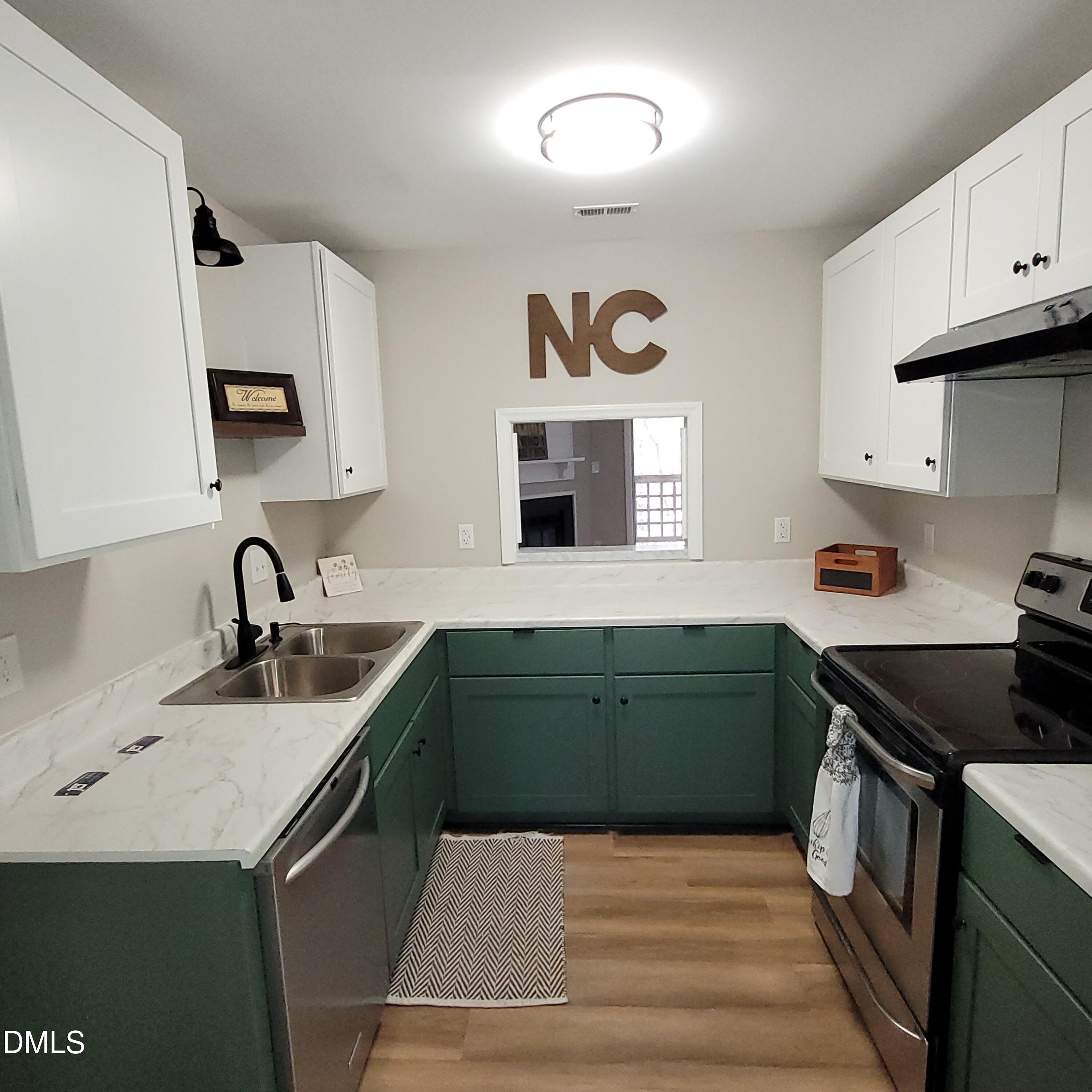 4651 Timbermill Court, Unit 103 Raleigh, NC 27612 - Photo 3 of 24 kitchen