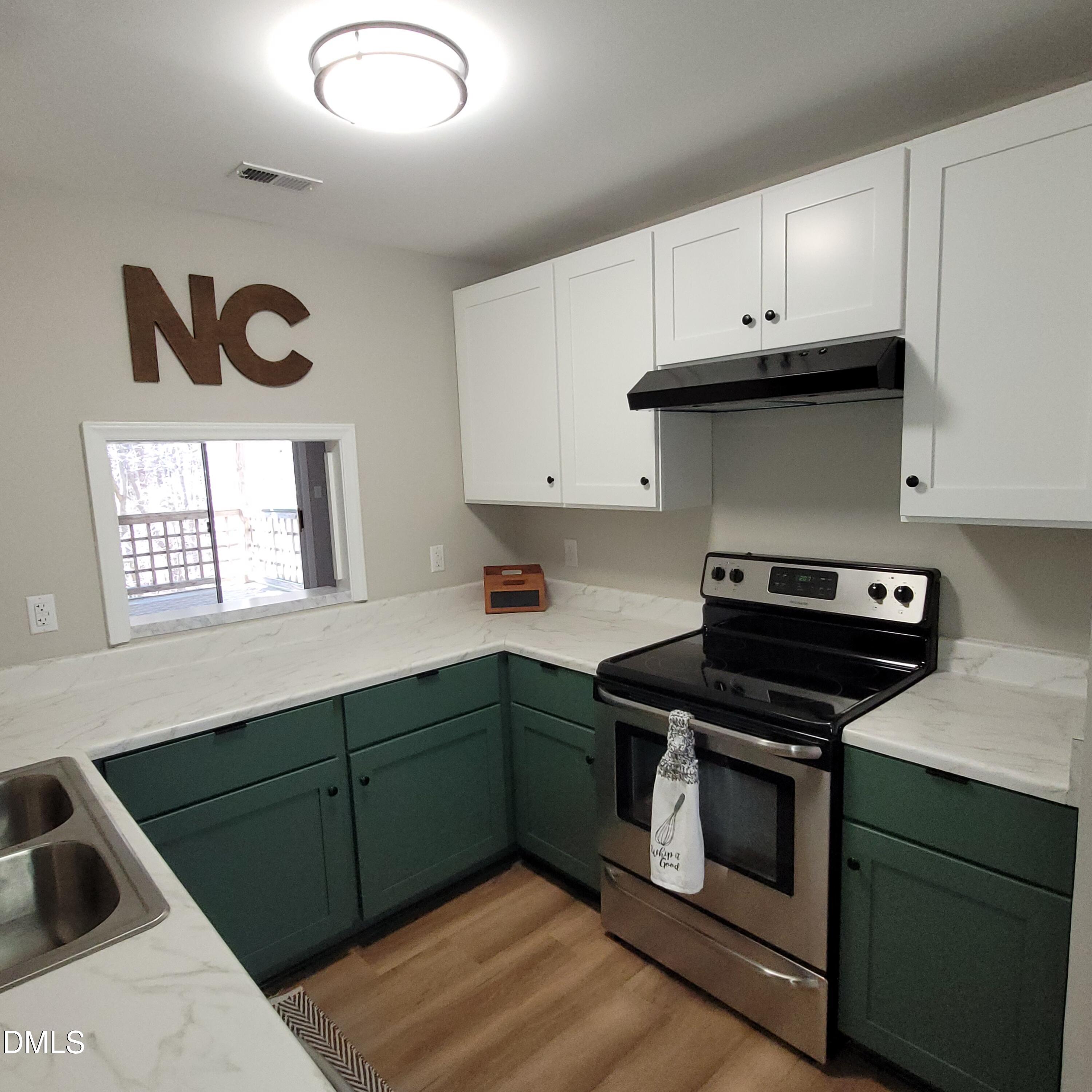 4651 Timbermill Court, Unit 103 Raleigh, NC 27612 - Photo 4 of 24 kitchen