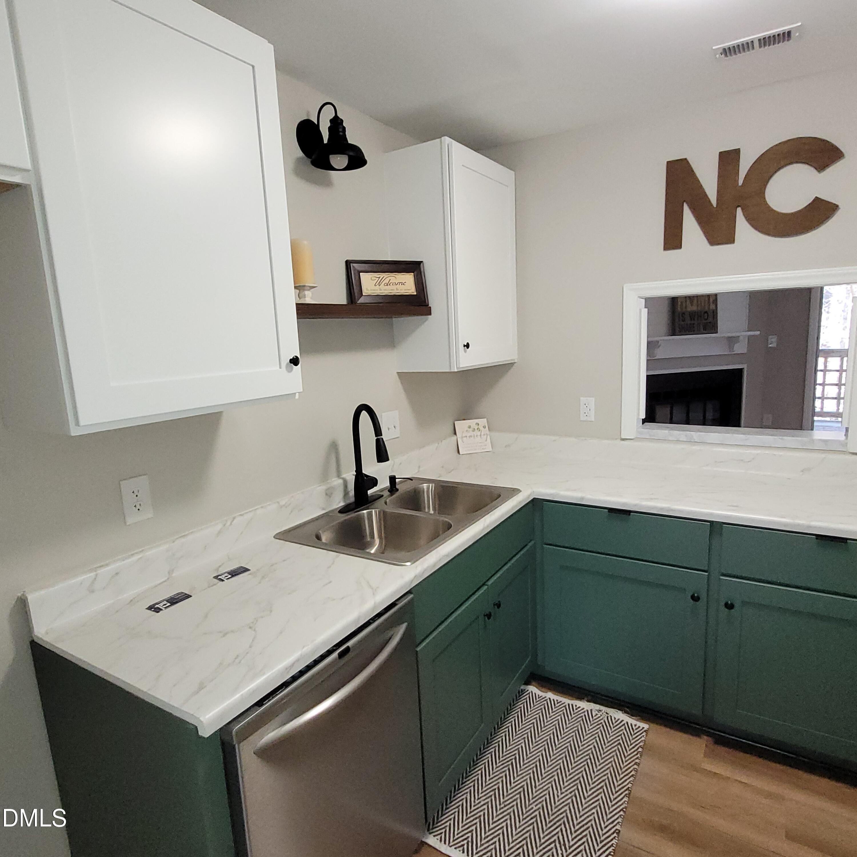 4651 Timbermill Court, Unit 103 Raleigh, NC 27612 - Photo 5 of 24 kitchen