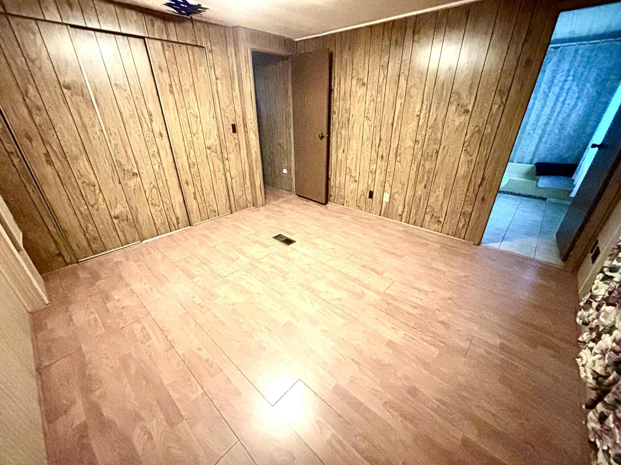 763 West 900 South Hebron, IN 46341 - Photo 15 of 27 a view of an empty room with wooden floor