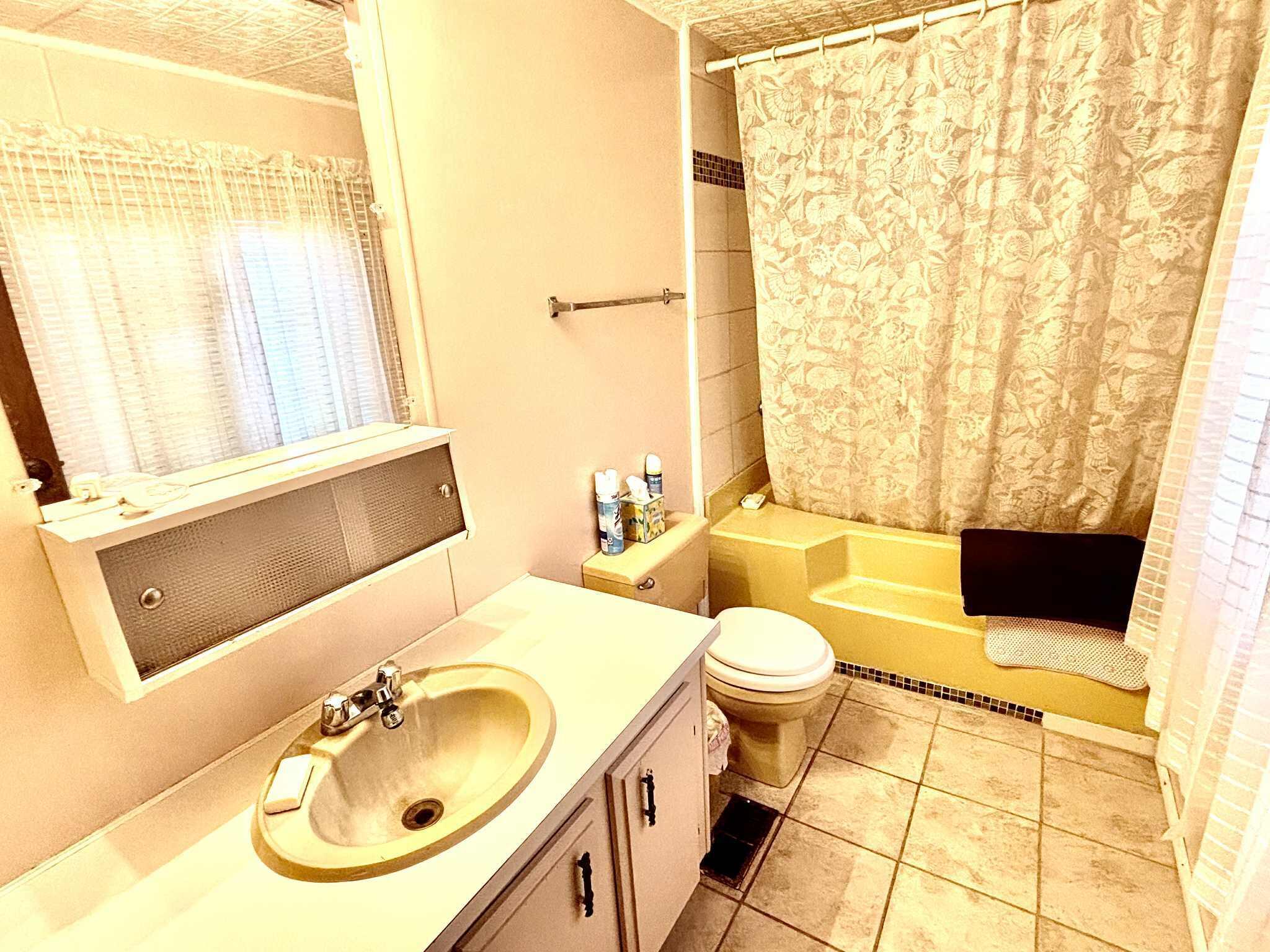 763 West 900 South Hebron, IN 46341 - Photo 16 of 27 a bathroom with a sink and a mirror