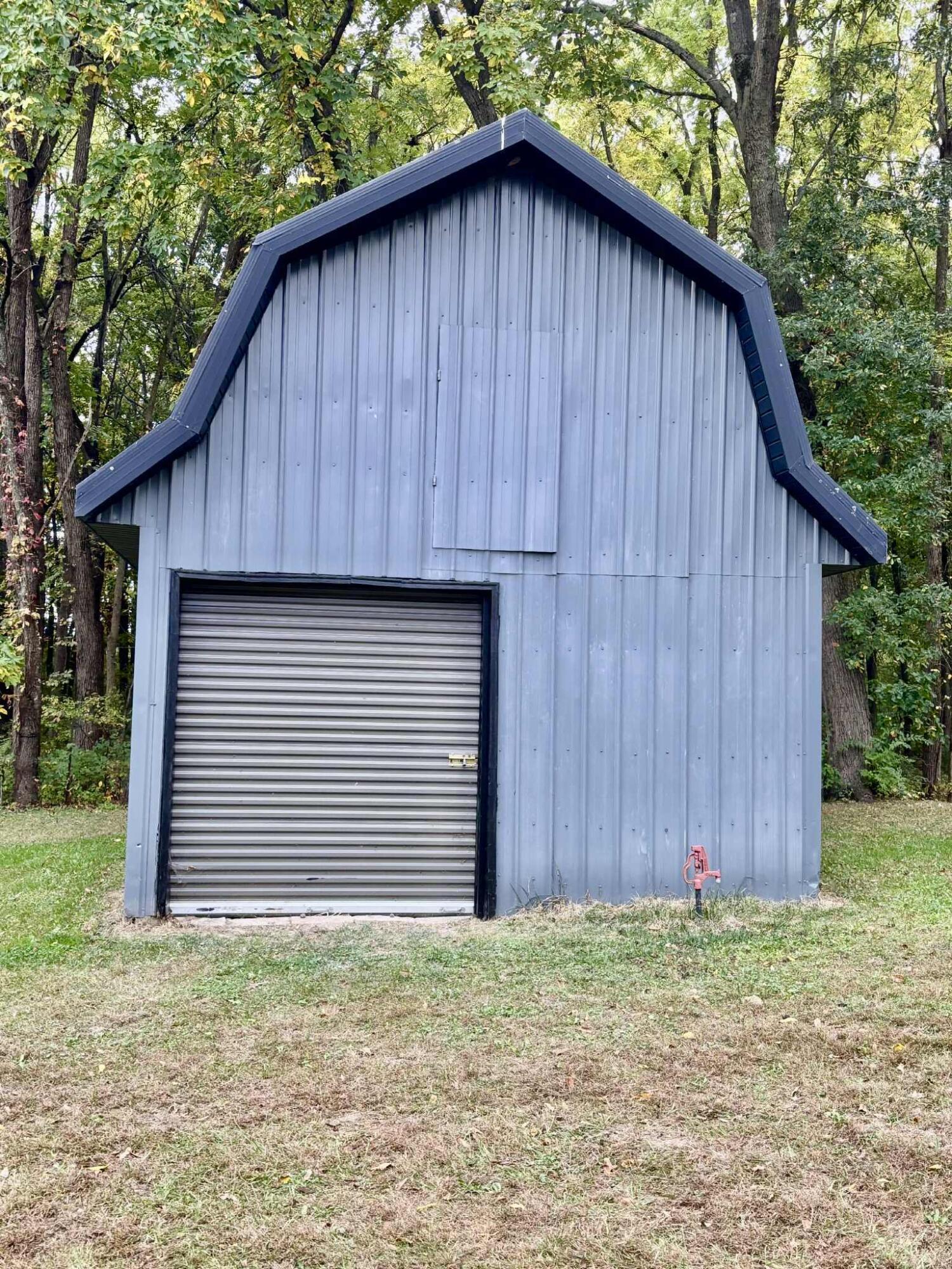 763 West 900 South Hebron, IN 46341 - Photo 19 of 27 a backyard of a house with wooden fence