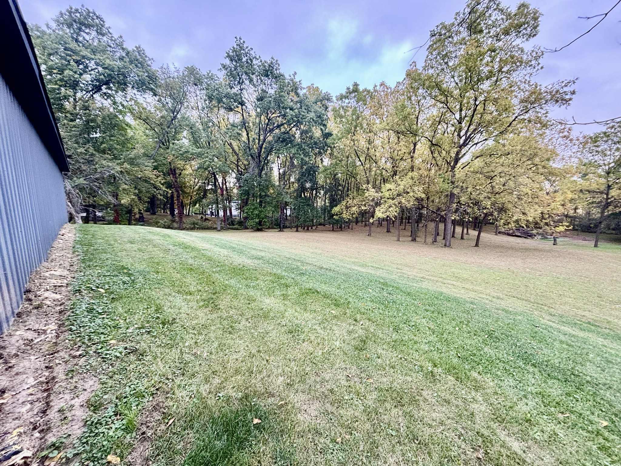 763 West 900 South Hebron, IN 46341 - Photo 23 of 27 a view of a field with trees in the background