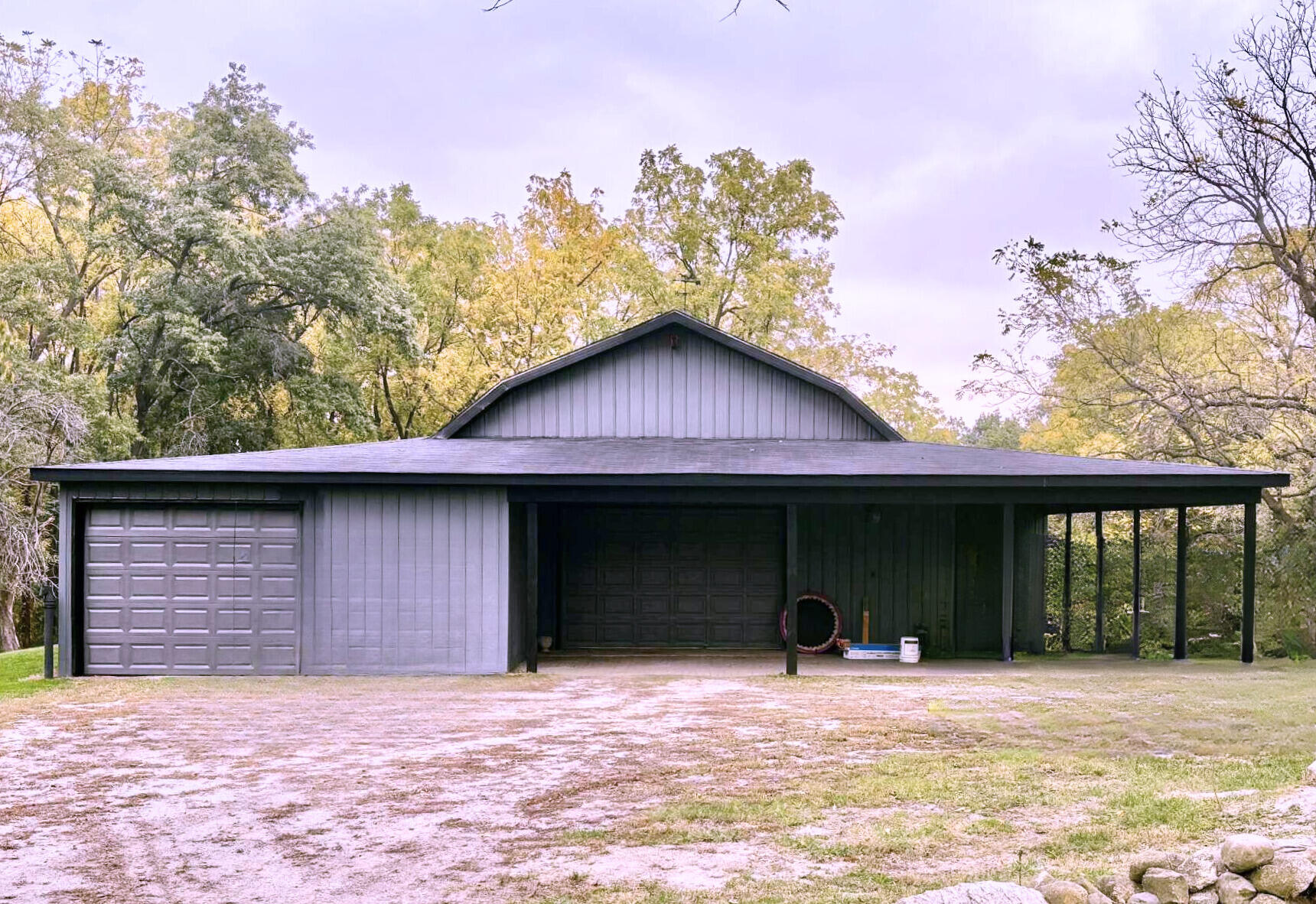 763 West 900 South Hebron, IN 46341 - Photo 3 of 27 a front view of a house with a yard and garage
