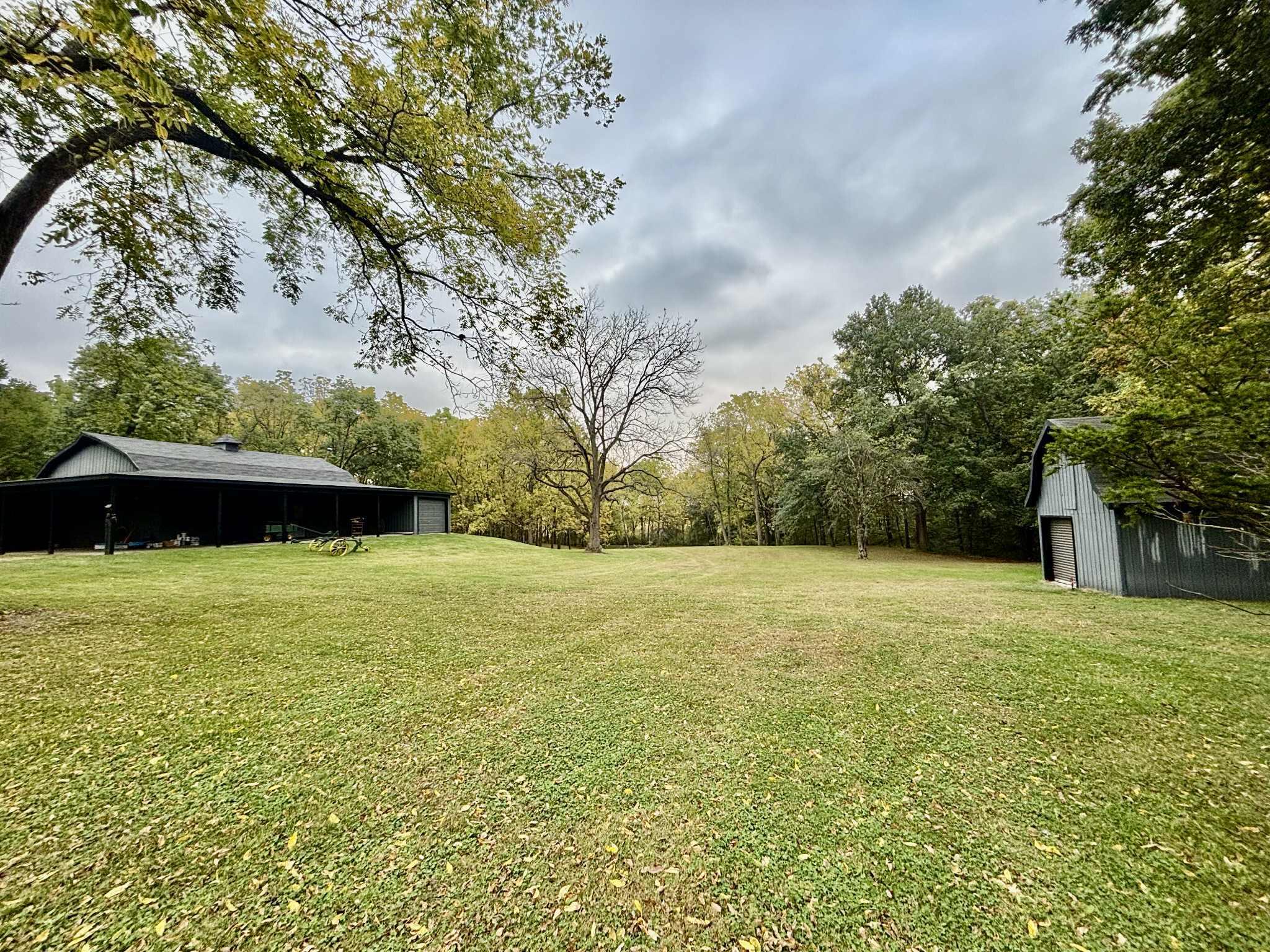 763 West 900 South Hebron, IN 46341 - Photo 5 of 27 a view of a yard with an outdoor space