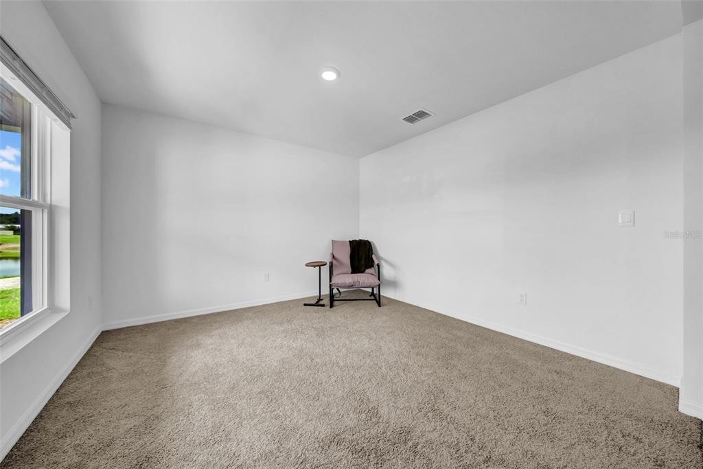 13295 Mylion Way, Unit 1 Spring Hill, FL 34610 - Photo 12 of 59 a room with a window