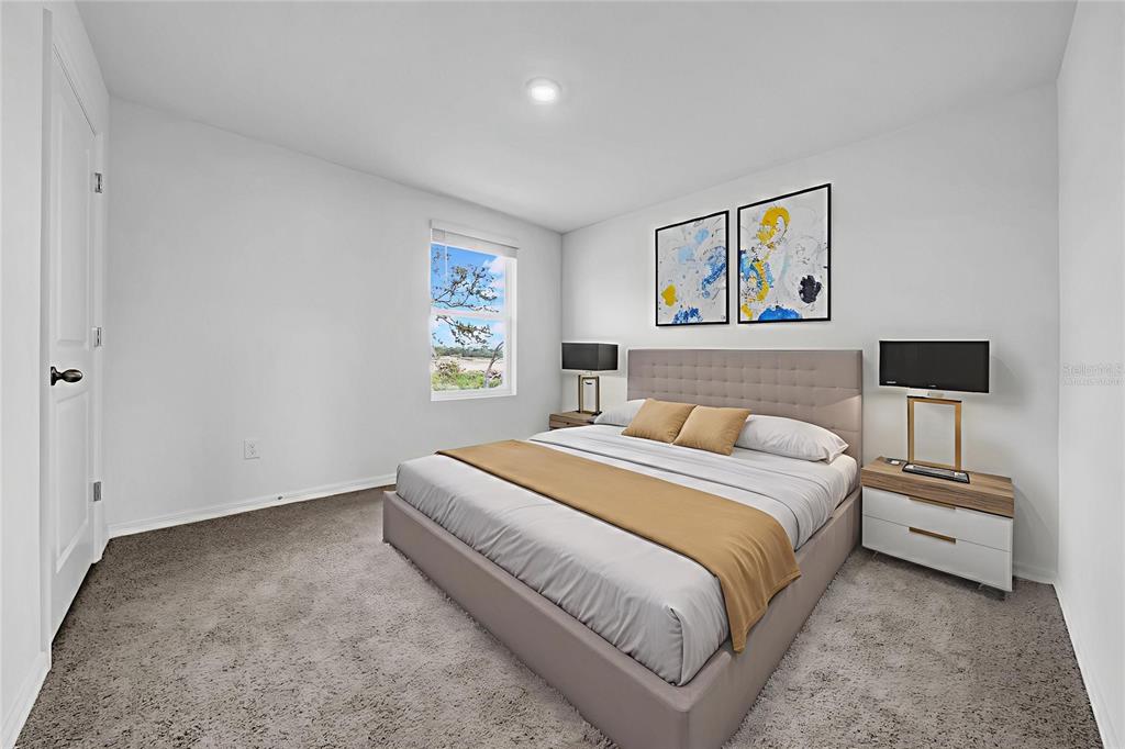 13295 Mylion Way, Unit 1 Spring Hill, FL 34610 - Photo 36 of 59 a bedroom with a bed and a night stand