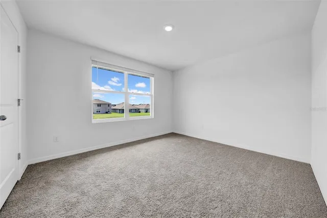 a bathroom with a toilet a sink and bathtub