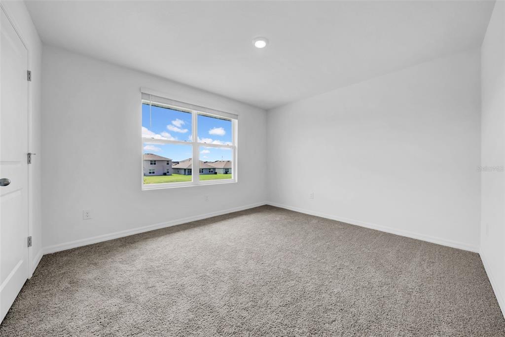 13295 Mylion Way, Unit 1 Spring Hill, FL 34610 - Photo 41 of 59 a view of an empty room with a window