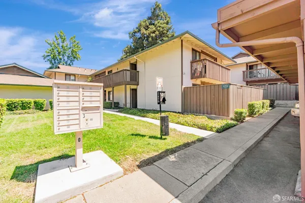 a house with swimming pool in front of it
