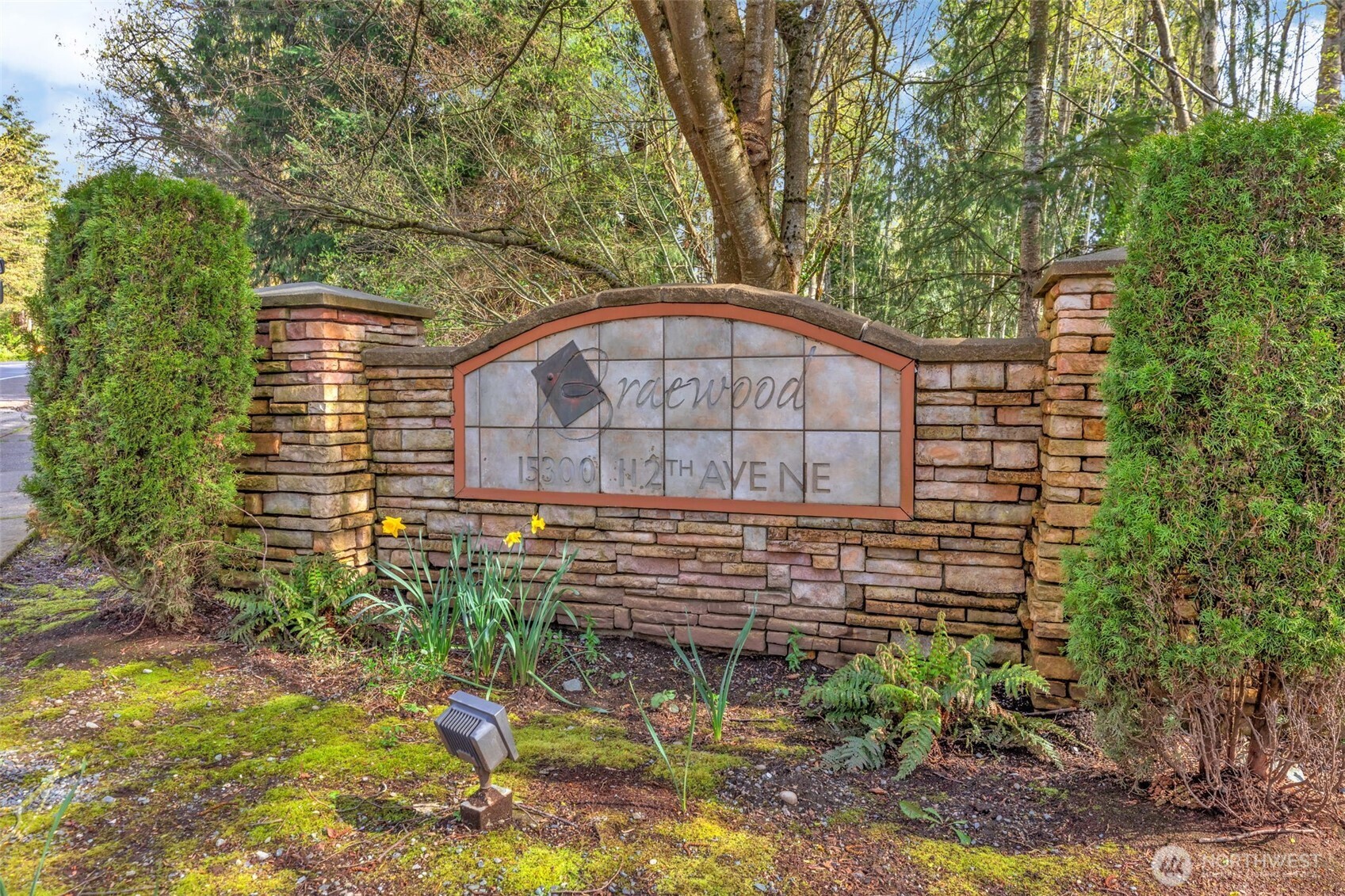 15300 112th Avenue Northeast, Unit C307 Bothell, WA 98011 - Photo 5 of 29 a view of a wooden door with a yard