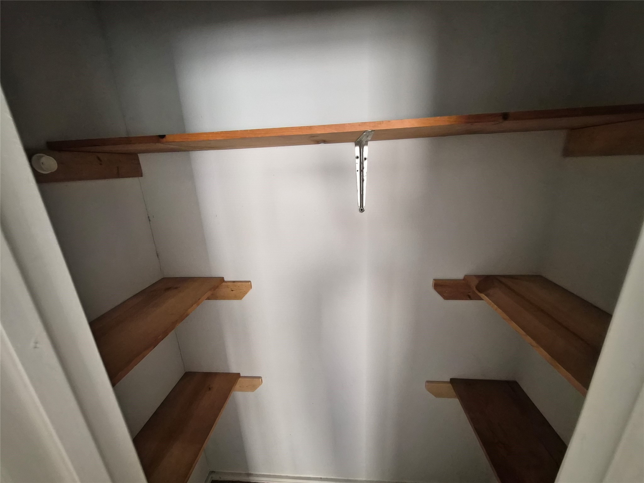 12335 Roy Road, Unit A Pearland, TX 77581 - Photo 13 of 16 a view of small space with racks on the wall