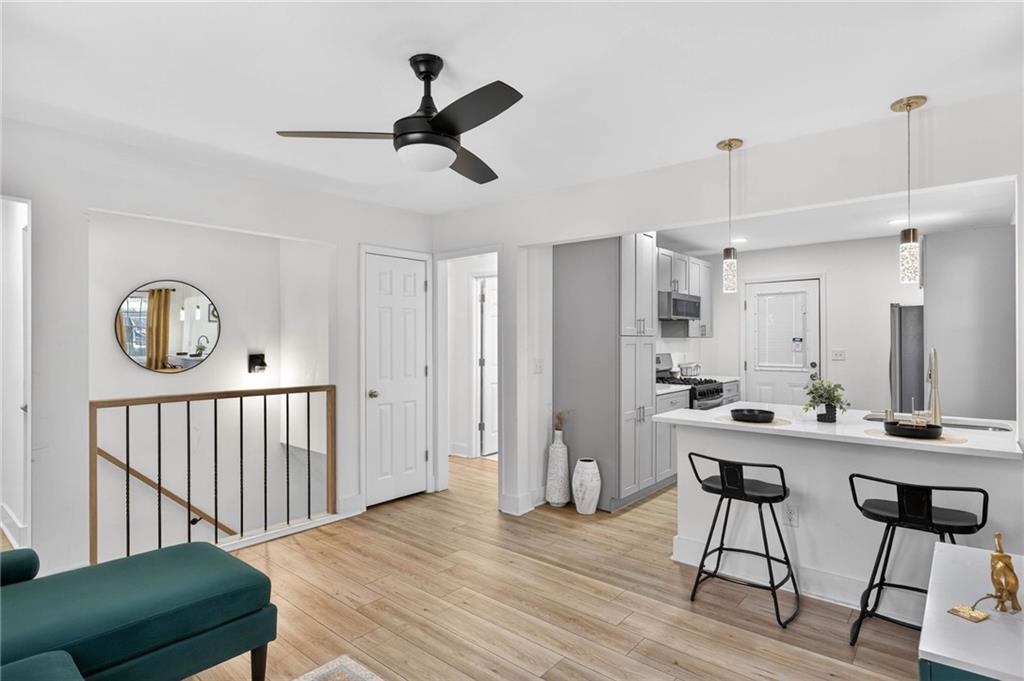 1939 Brannen Road Southeast Atlanta, GA 30316 - Photo 14 of 30 a view of a room with furniture and wooden floor