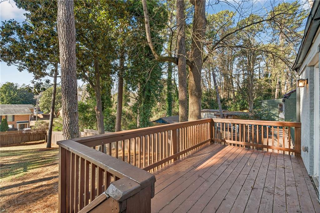 1939 Brannen Road Southeast Atlanta, GA 30316 - Photo 24 of 30 a view of balcony with wooden floor and fence