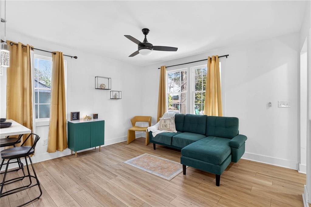 1939 Brannen Road Southeast Atlanta, GA 30316 - Photo 5 of 30 a living room with furniture and a window