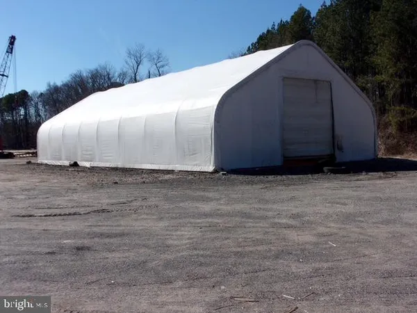 a white house with a yard