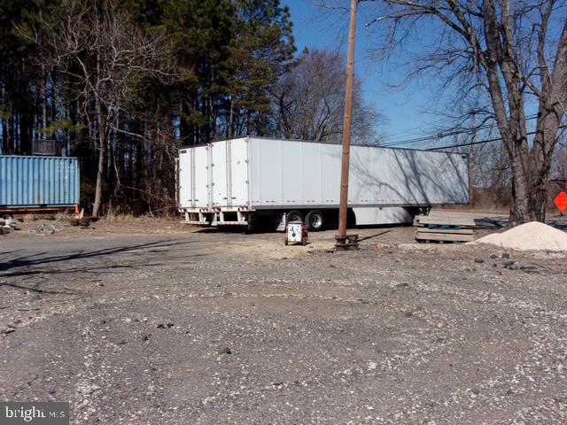 313 Tansboro Road Berlin, NJ 08009 - Photo 9 of 11 a view of building with outdoor space
