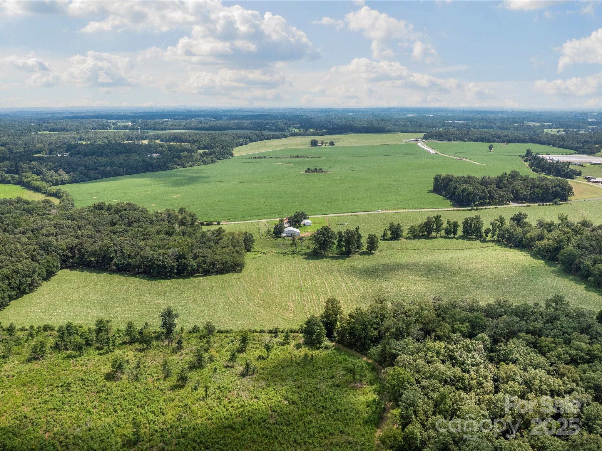 0 Thanny Helms Road Peachland, NC 28133 - Photo 5 of 12 an aerial view of a houses with outdoor space