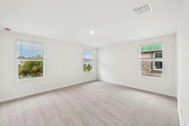 an empty room with windows