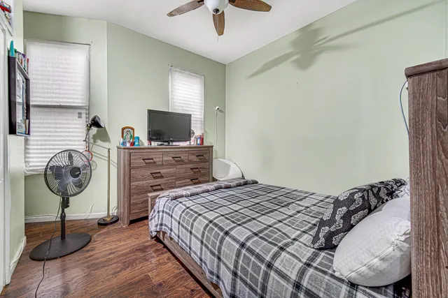 a bathroom with a sink a toilet and a shower