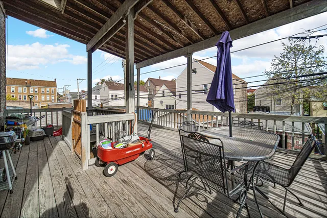 a car parked in front of a white building