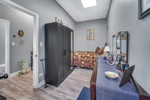 a view of a livingroom with furniture and wooden floor