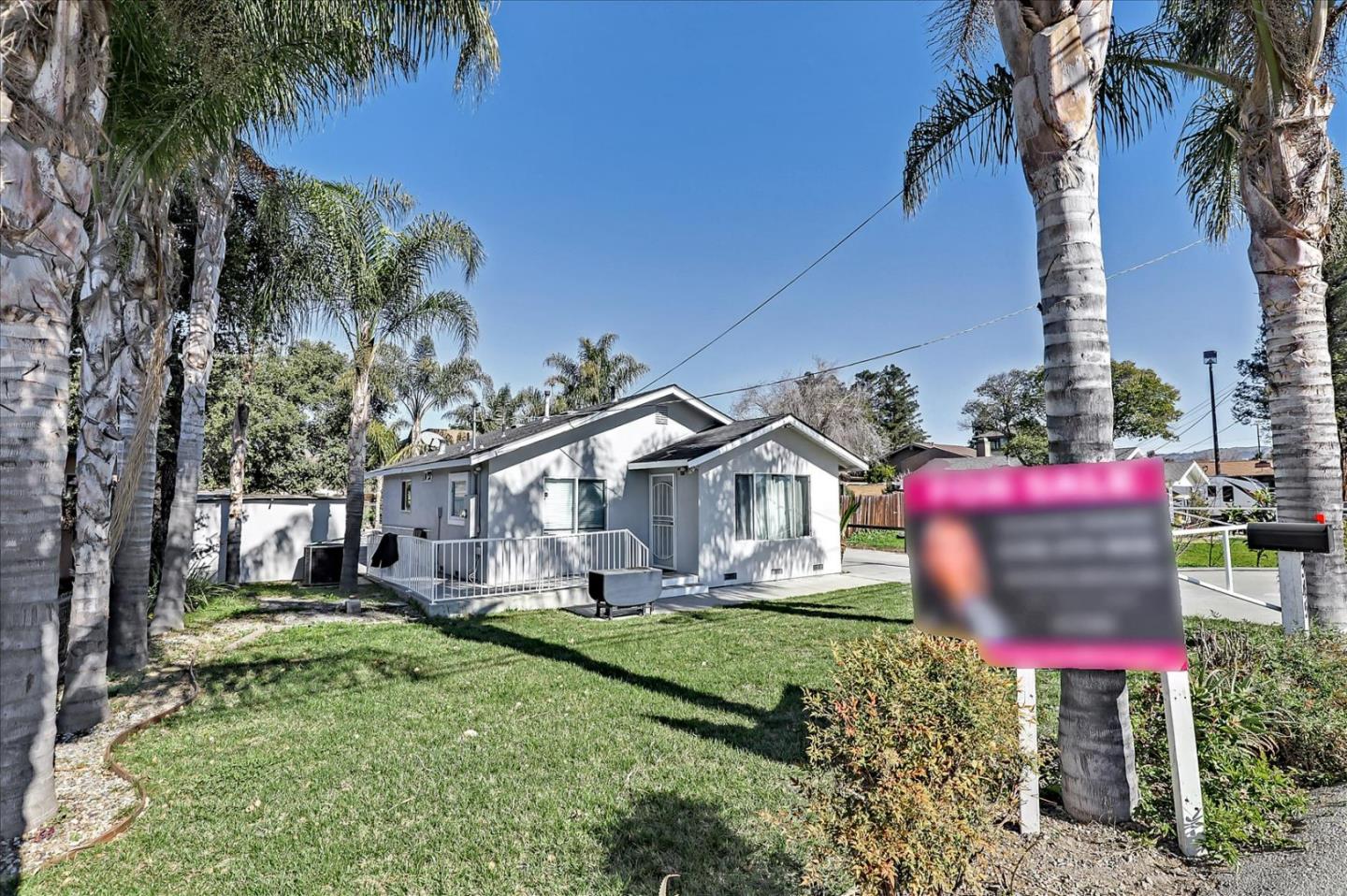 345 Leavesley Road Gilroy, CA 95020 - Photo 12 of 12 a front view of a house with a yard and potted plants