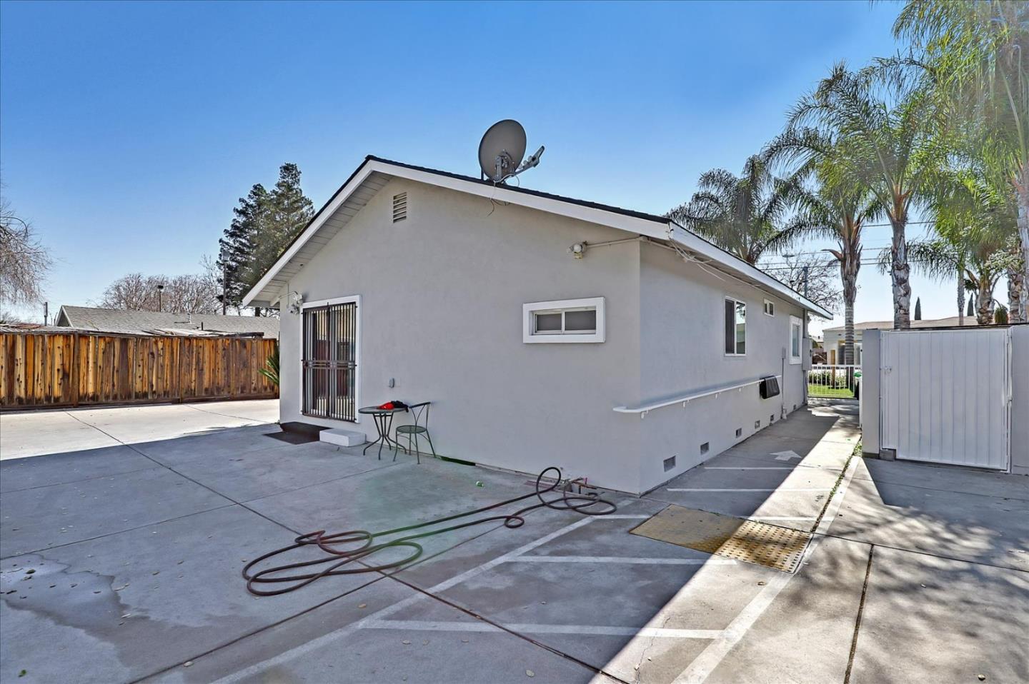 345 Leavesley Road Gilroy, CA 95020 - Photo 3 of 12 a front view of a house with parking area