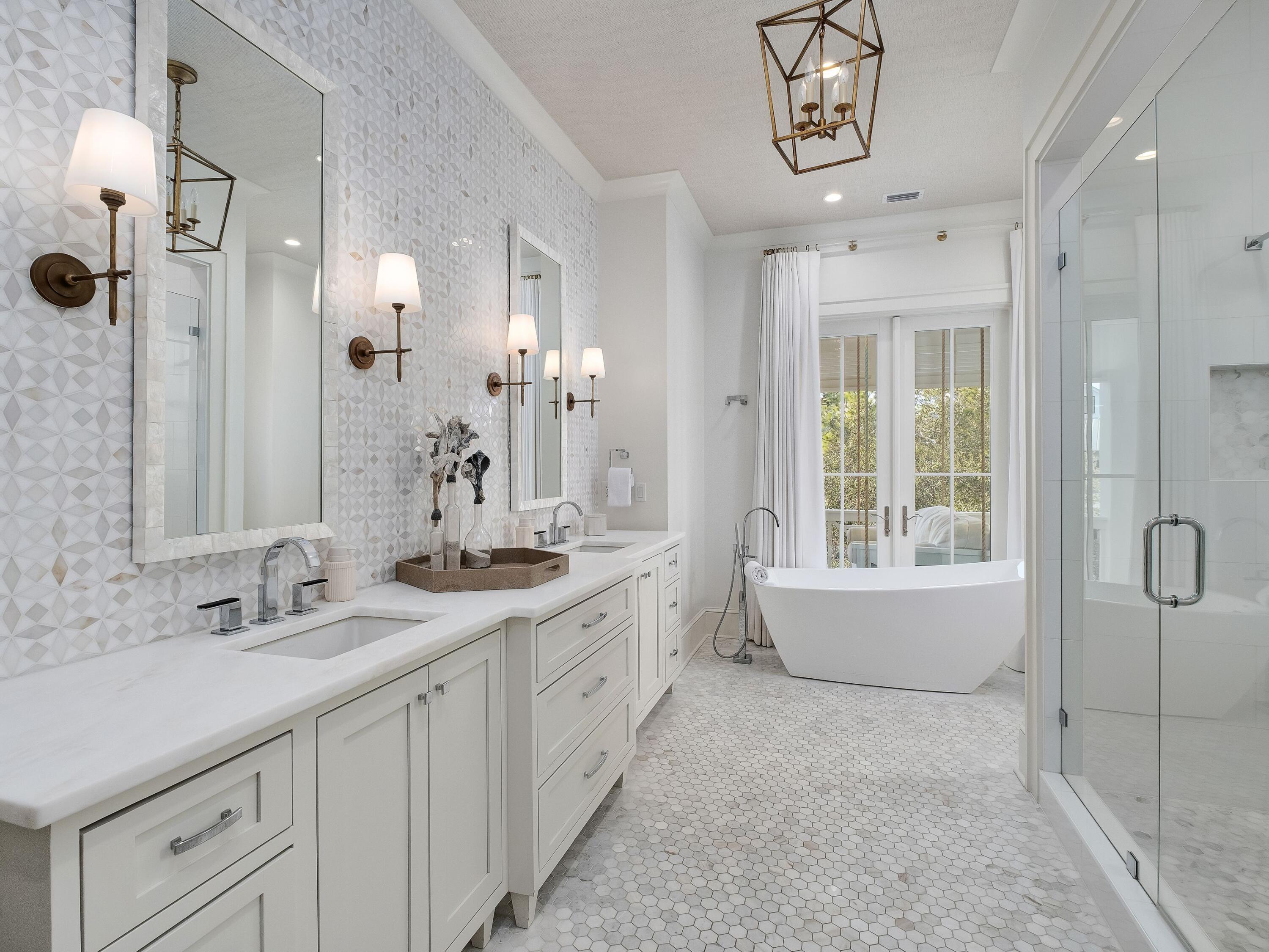 26 Rain Lily Lane Santa Rosa Beach, FL 32459 - Photo 17 of 45 a spacious bathroom with a double vanity sink mirror and bathtub