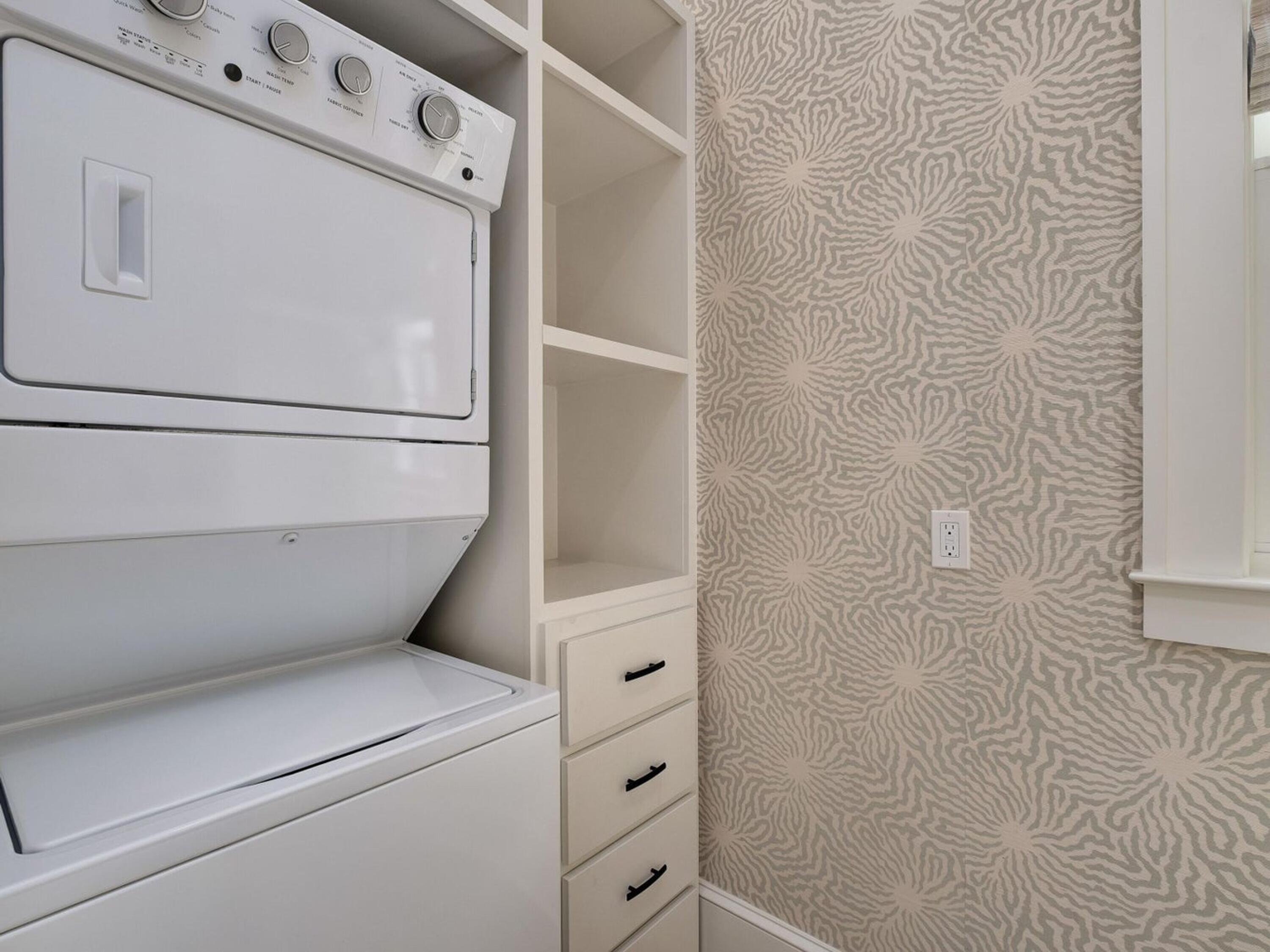 26 Rain Lily Lane Santa Rosa Beach, FL 32459 - Photo 35 of 45 a close up of a washer and dryer