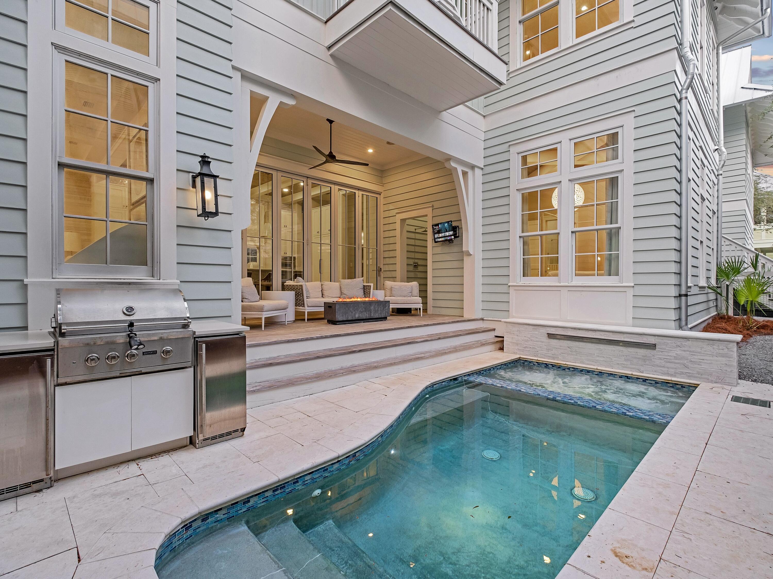 26 Rain Lily Lane Santa Rosa Beach, FL 32459 - Photo 38 of 45 a view of a kitchen with granite countertop a sink and a stove