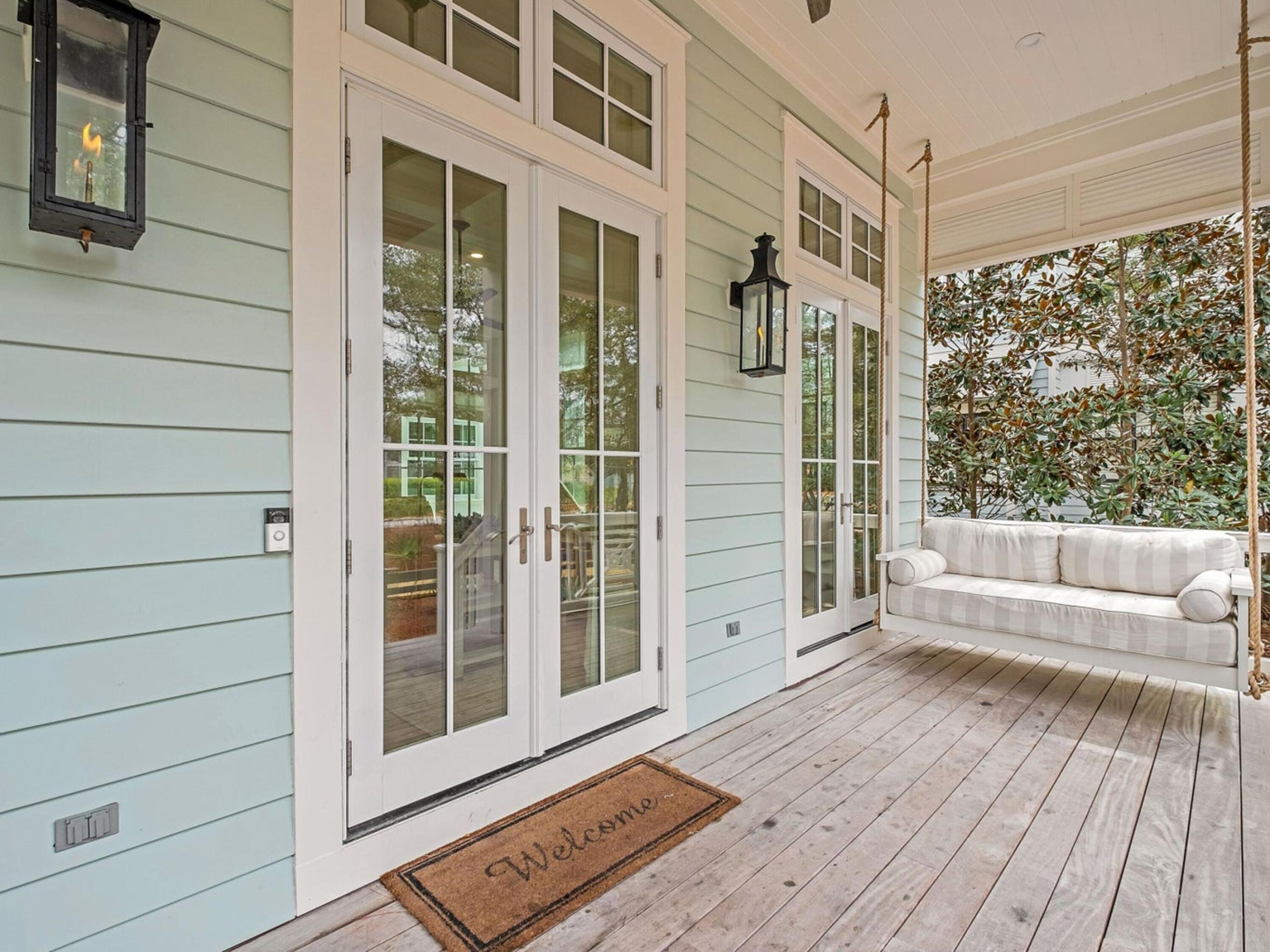 26 Rain Lily Lane Santa Rosa Beach, FL 32459 - Photo 10 of 45 a view of a balcony with wooden floor and fence