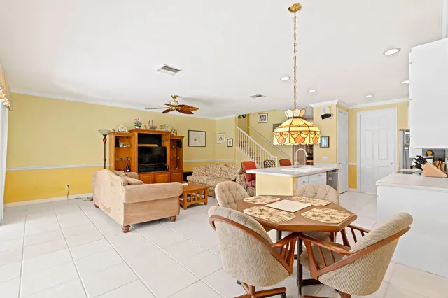 a living room with furniture and flat screen tv