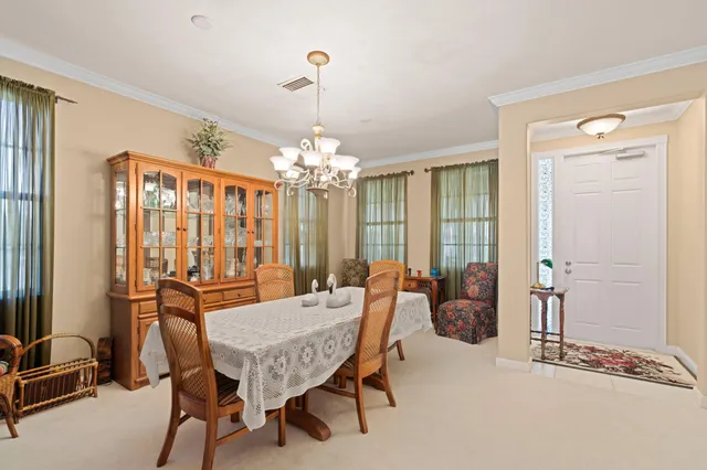 a view of a livingroom with furniture and window