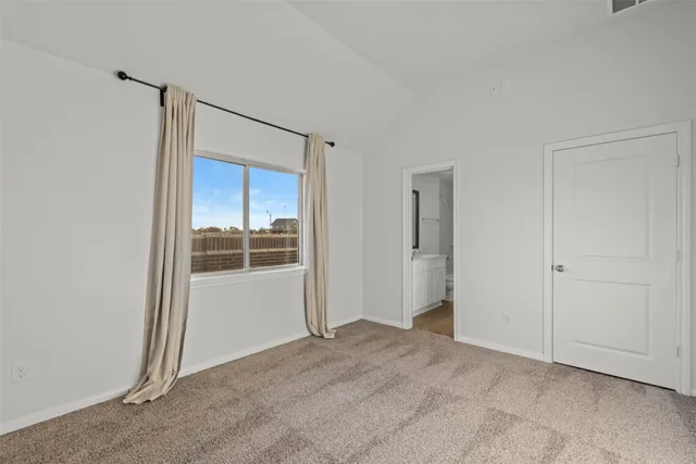 a view of an empty room with window