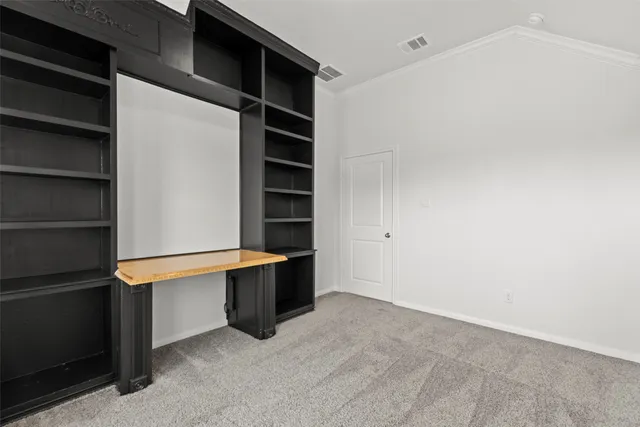 a view of an empty walk in closet