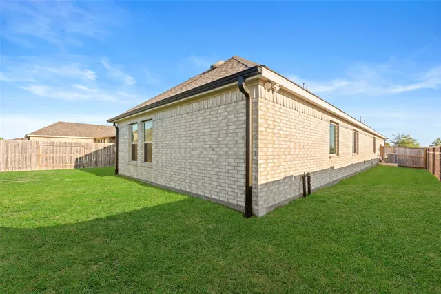 a view of a backyard with a garden