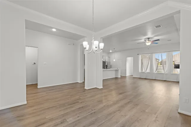 a view of a livingroom with wooden floor