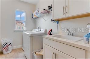 7211 Still Pond Lane Windermere, FL 34786 - Photo 13 of 17 a bathroom with a sink and a mirror