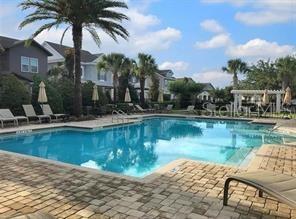 7211 Still Pond Lane Windermere, FL 34786 - Photo 17 of 17 a view of a lake with a house