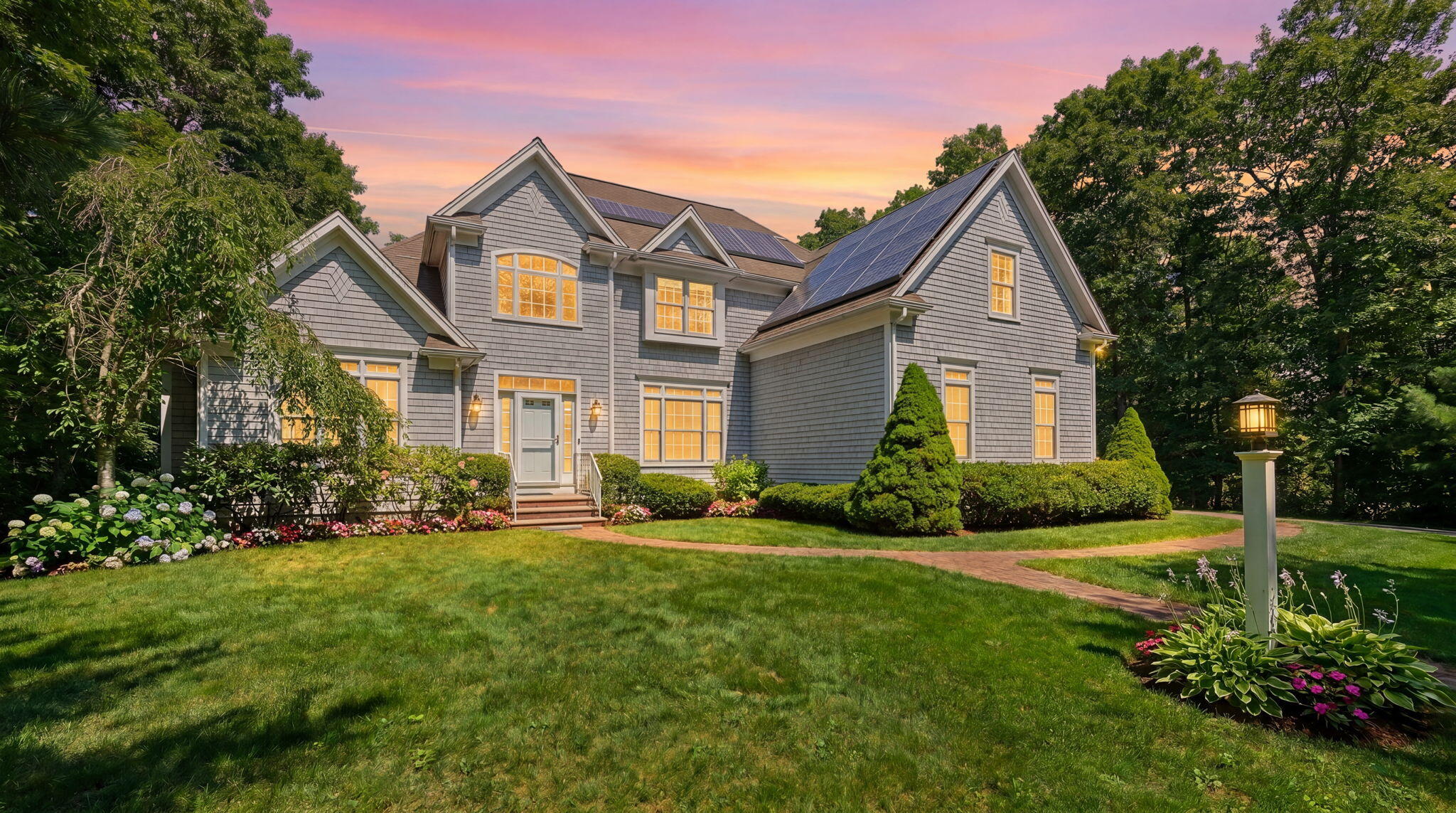 17 Payamps Road Mashpee, MA 02649 - Photo 3 of 72 a front view of a house with a yard and trees