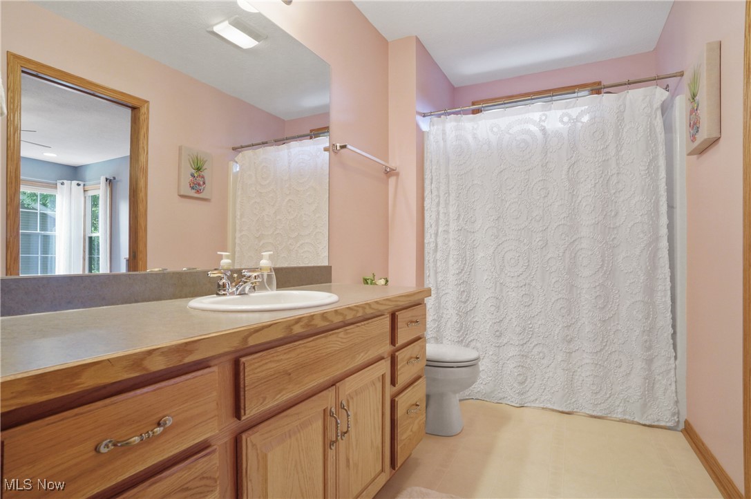 4265 Ridge Crest Drive Akron, OH 44321 - Photo 32 of 49 Bathroom featuring toilet and vanity