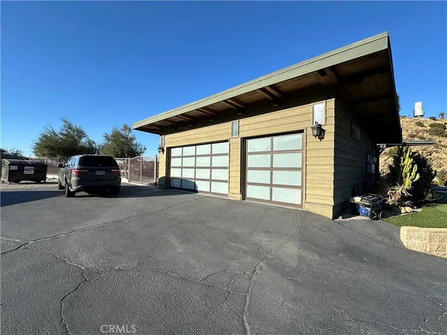 a view of car parked in front of house