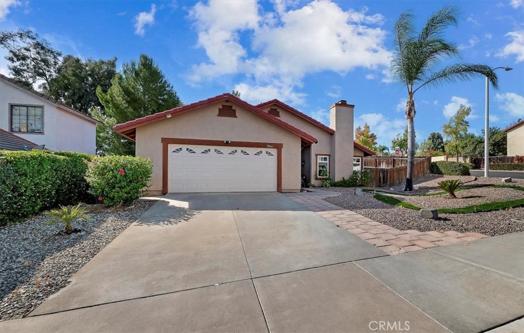 39661 Old Spring Road Murrieta, CA 92563 - Photo 1 of 1 a front view of a house with a yard and garage