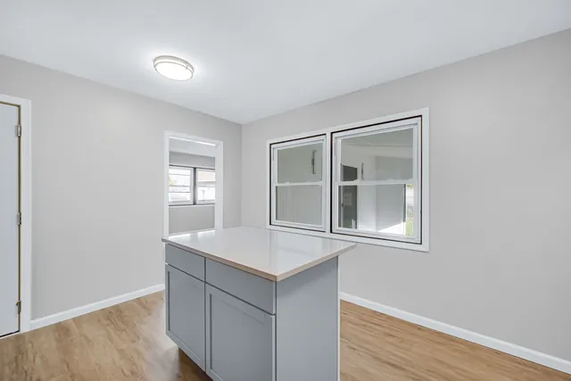 a room with window and closet