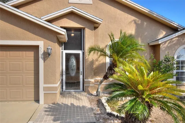 a view of livingroom and kitchen with windows