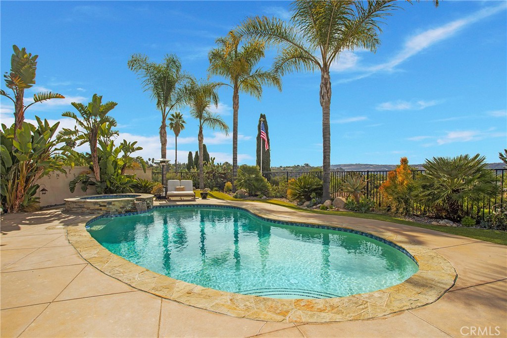 25222 Del Rio Laguna Niguel, CA 92677 - Photo 17 of 37 a view of a swimming pool with a yard